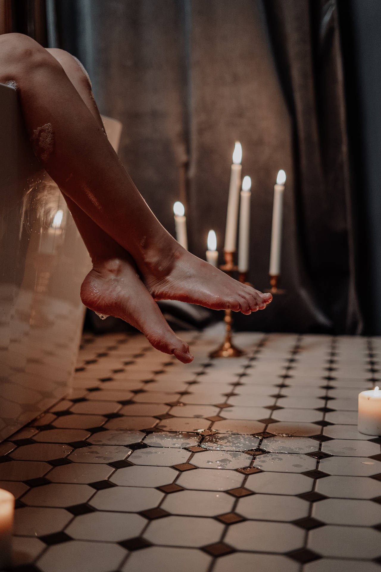 Feet Dangling On A Bathtub