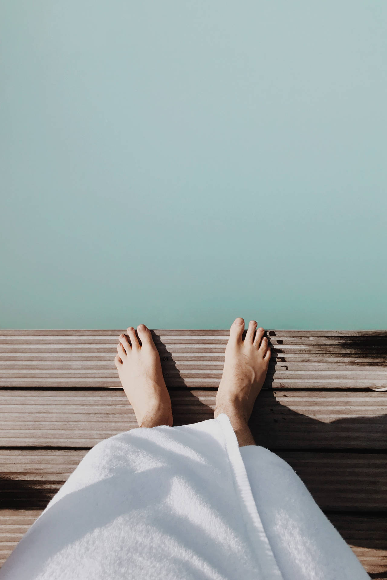 Feet On Wooden Floor Background