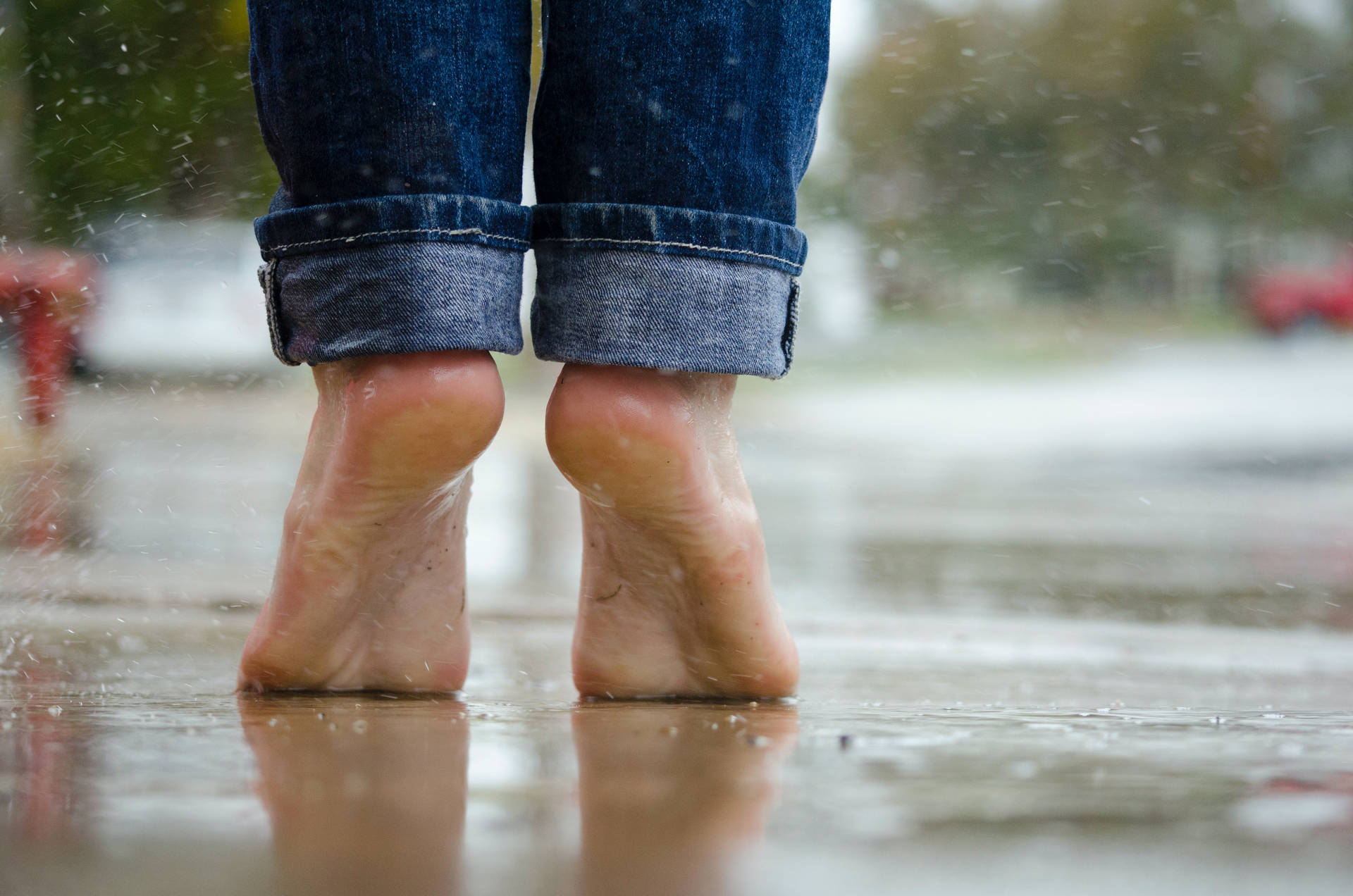 Feet Tiptoeing In The Rain Background