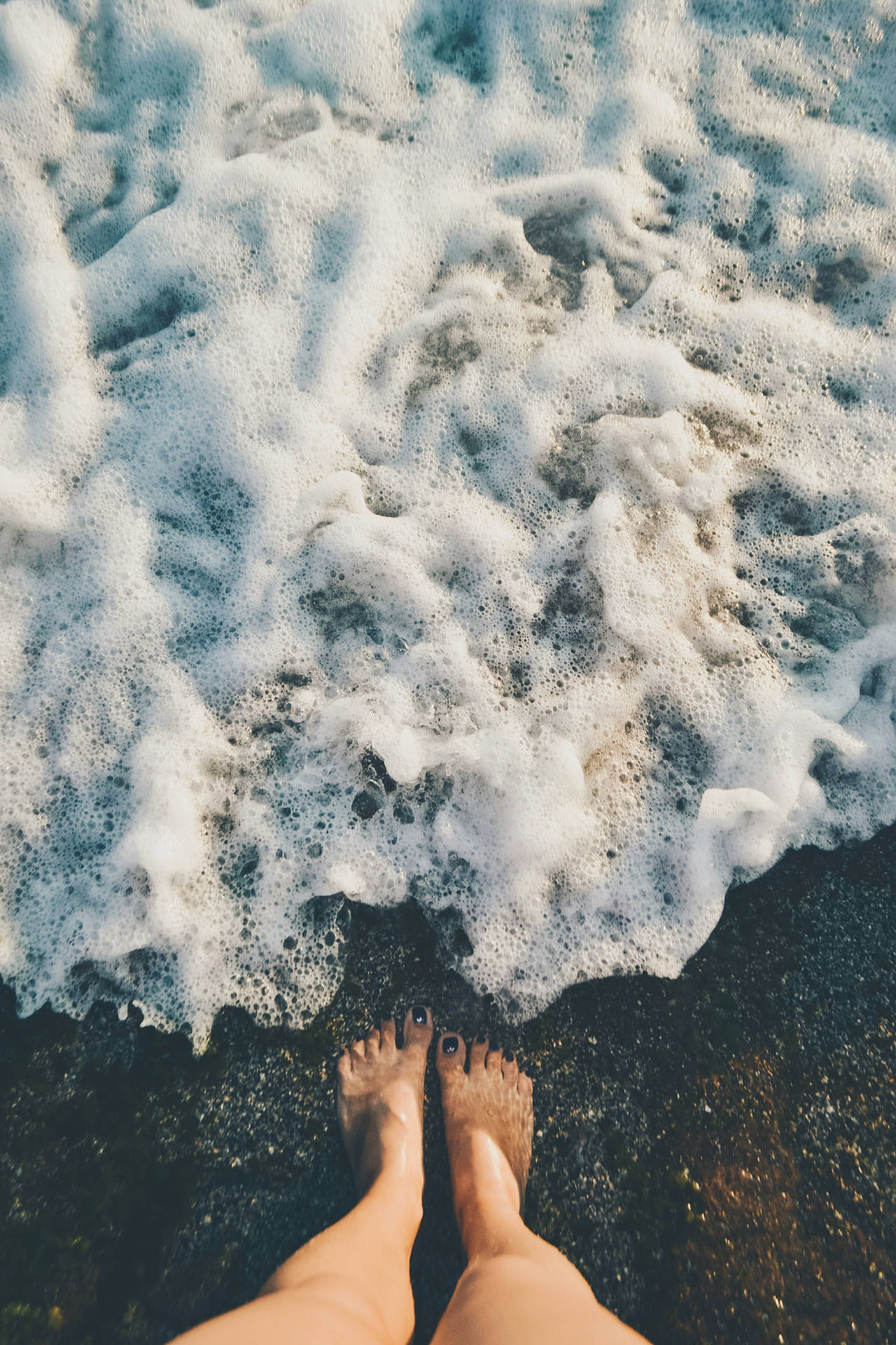 Feet With Foamy Sea Waves Background