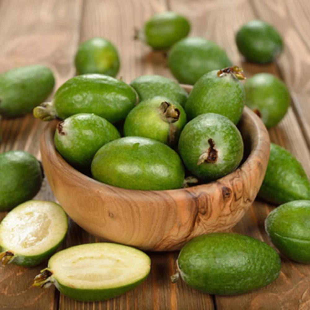 Feijoa In The Wooden Bowl Background