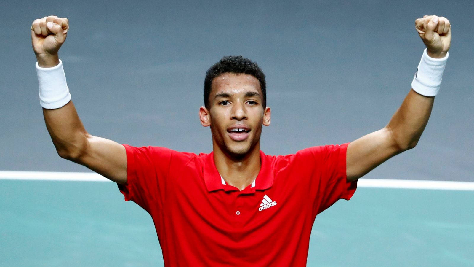 Felix Auger Aliassime Double Fist Pumps Background