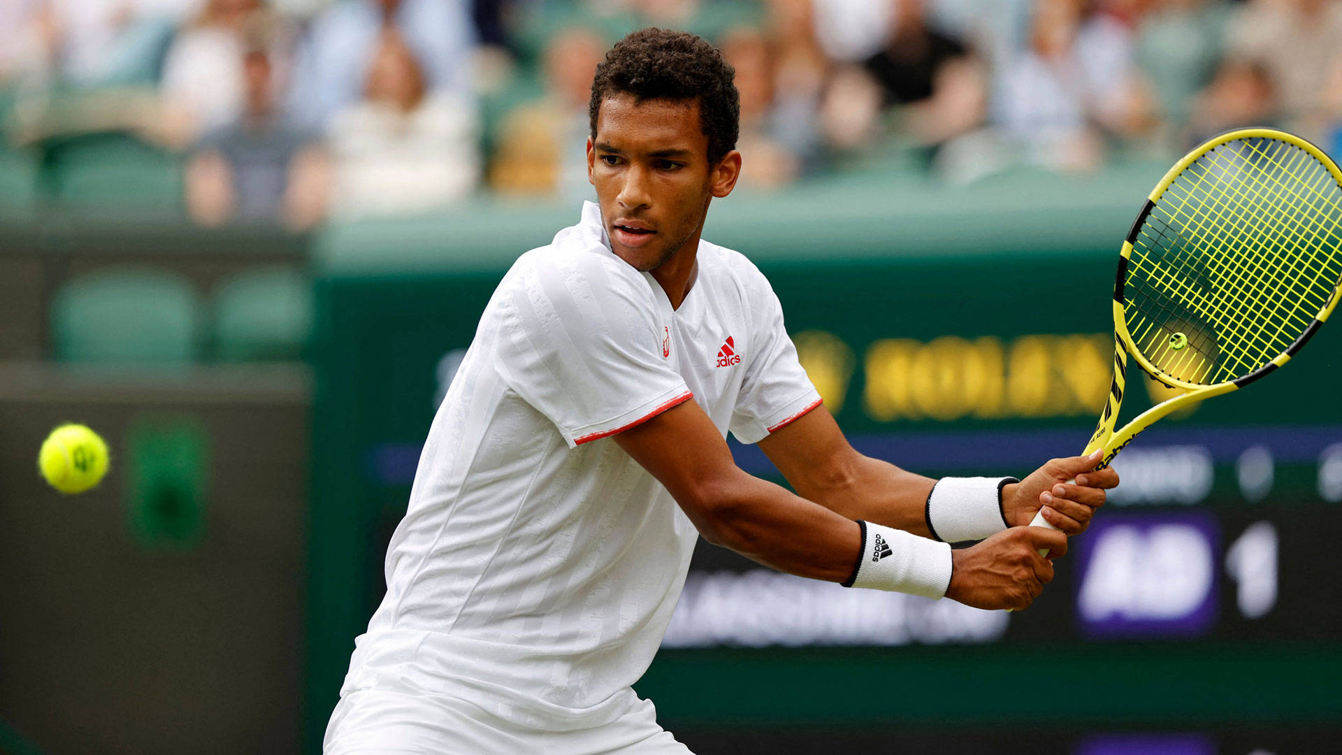 Felix Auger-aliassime In Action With His Tennis Racket