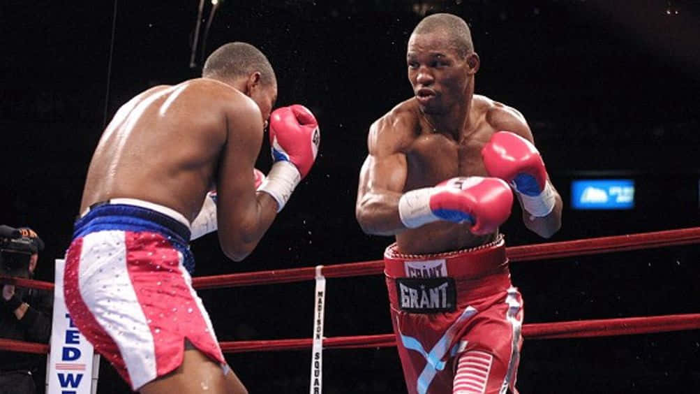 Felix Trinidad Above The Boxing Ring Background