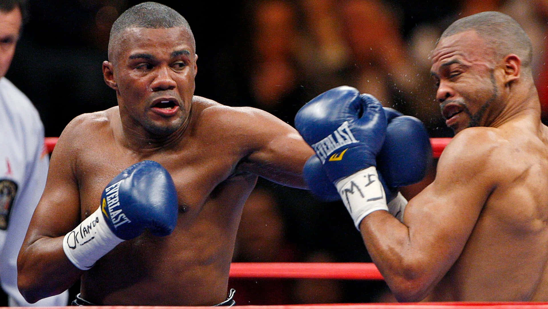 Felix Trinidad On His Dark Blue Boxing Gloves Background