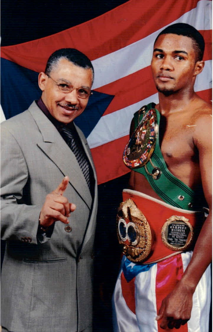Felix Trinidad Together With The Man In Suit Background