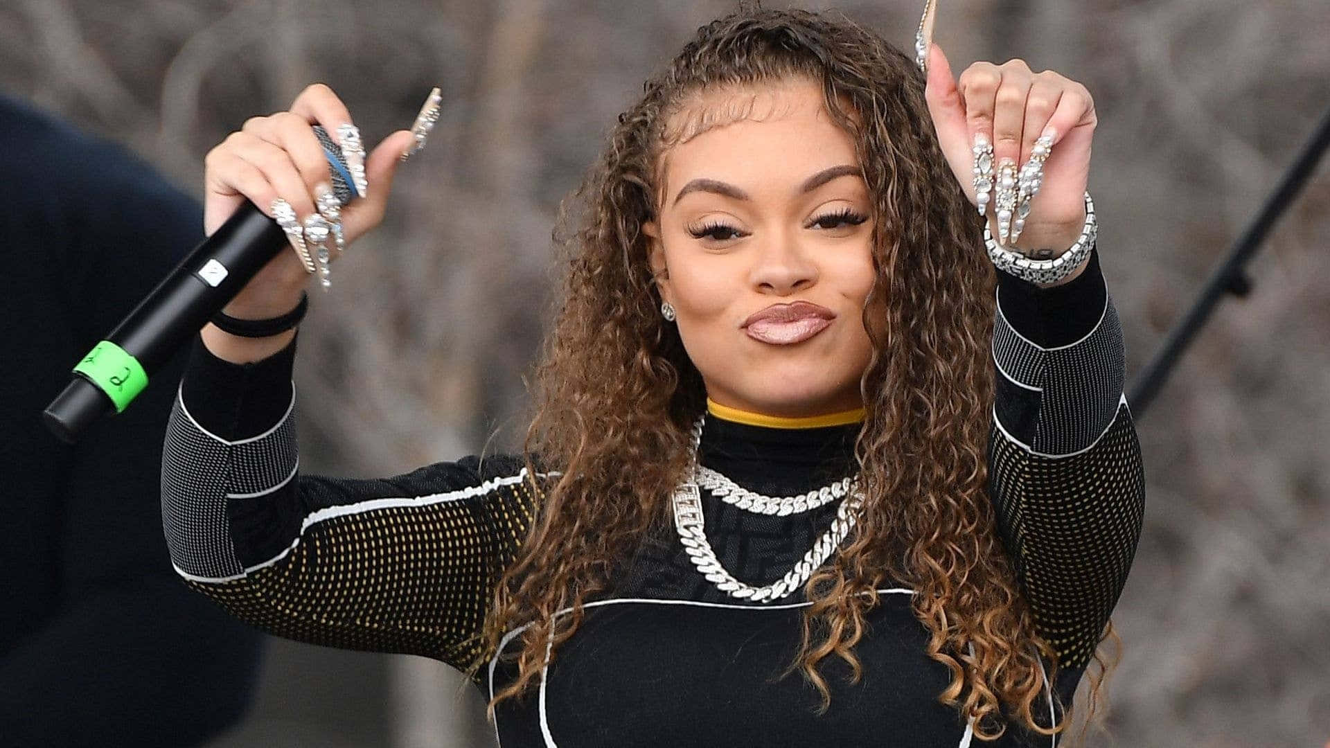 Female_ Artist_ Performing_ With_ Microphone