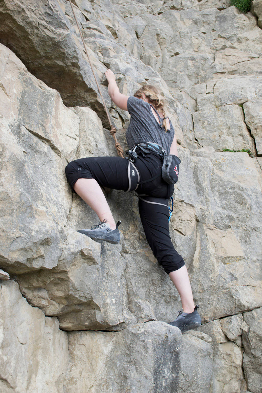 Female Crawling Up Sport Climbing Background