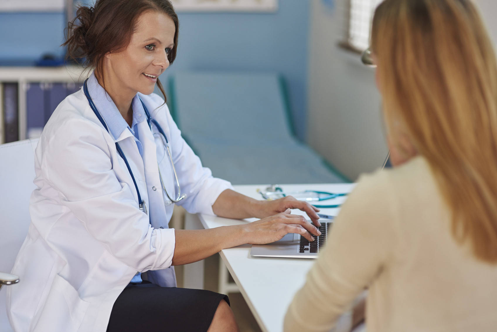 Female Doctor And Female Patient Background