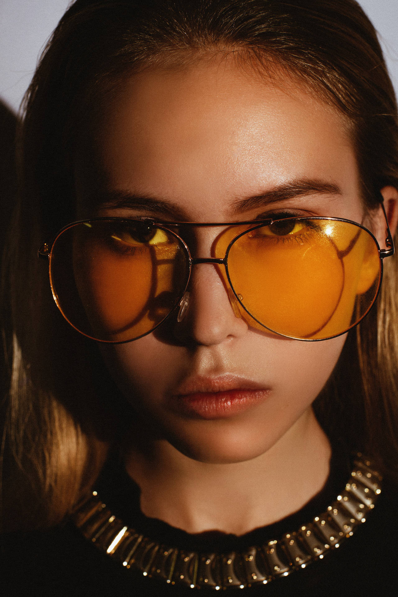 Female Model In Yellow Sunglasses Background