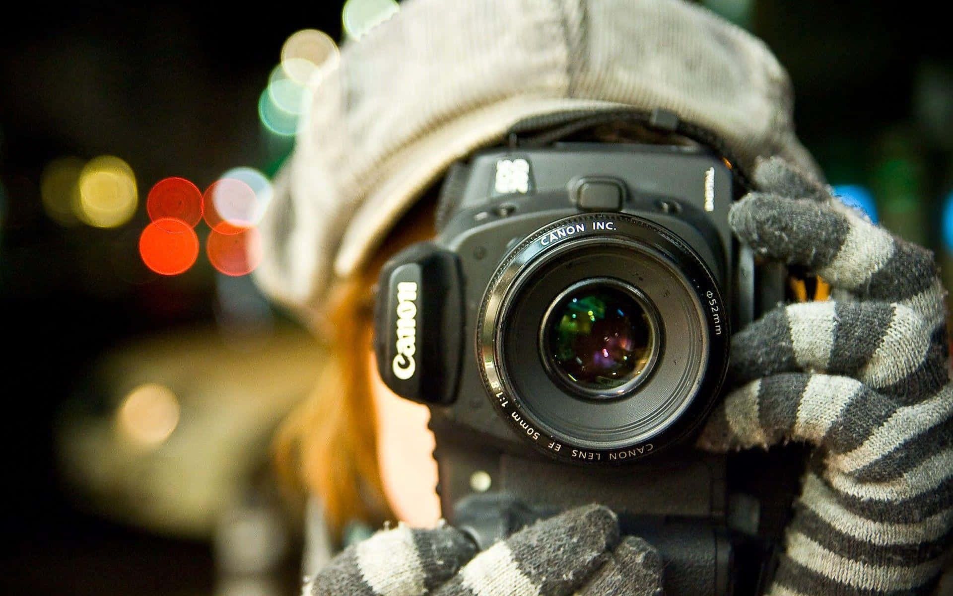 Female Photographer Holding Canon Photography Camera Background