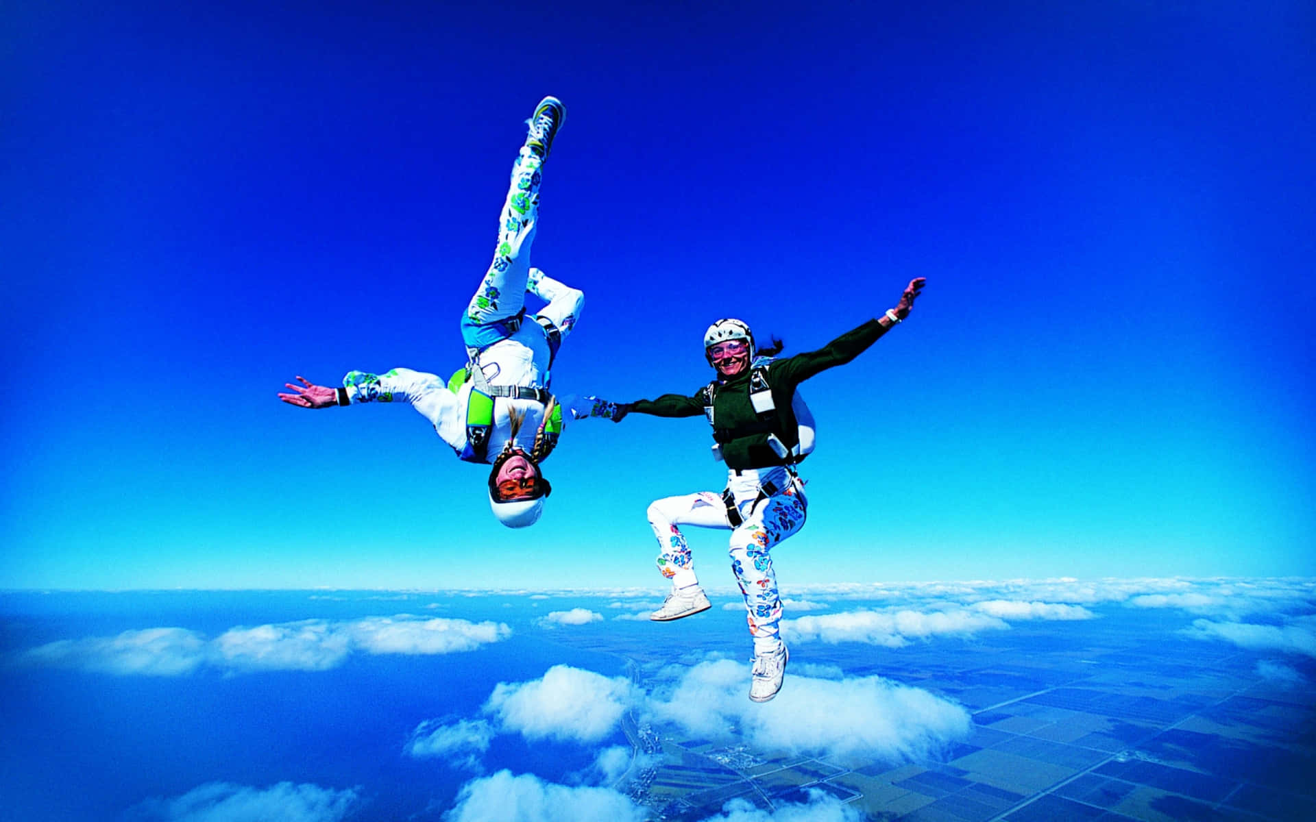 Female Skydiving Upside Down Background