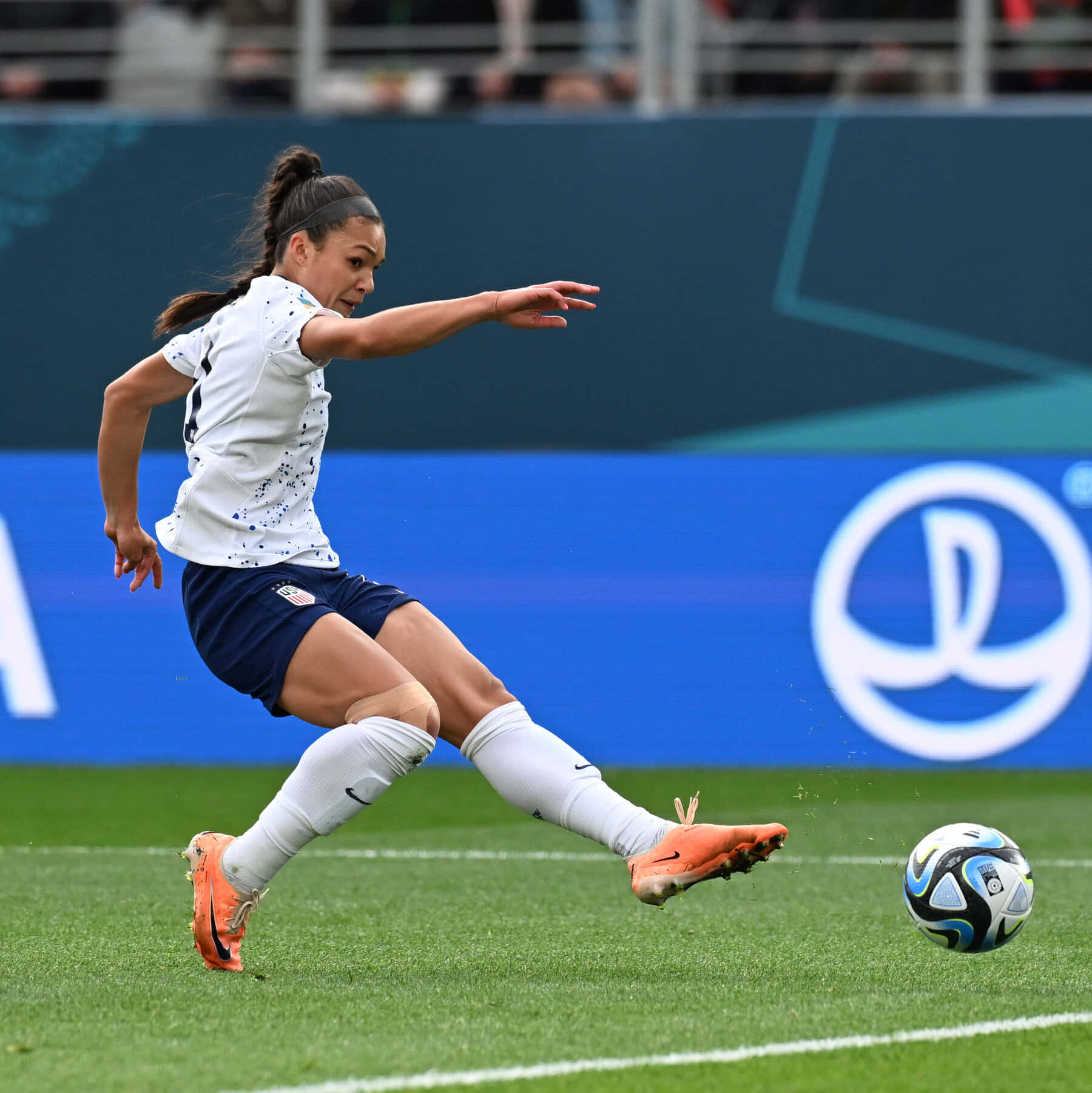 Female Soccer Player Action Shot Background