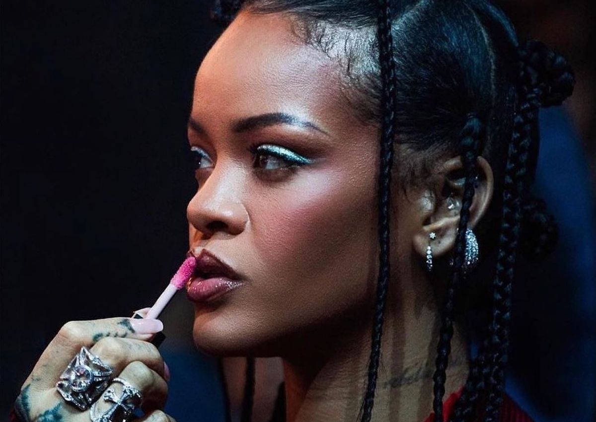 Fenty Rihanna Applying Lipstick