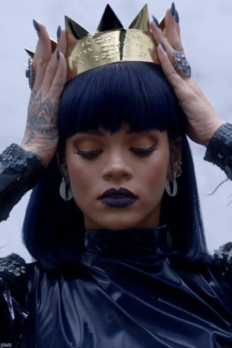 Fenty Rihanna Wearing A Crown Background