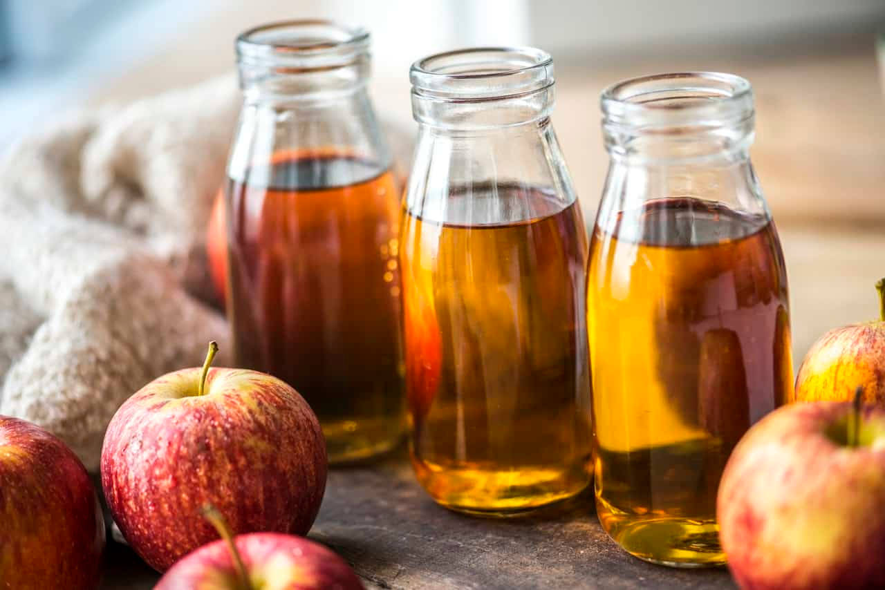 Fermented Apple Juice Turned Apple Cider Vinegar Background