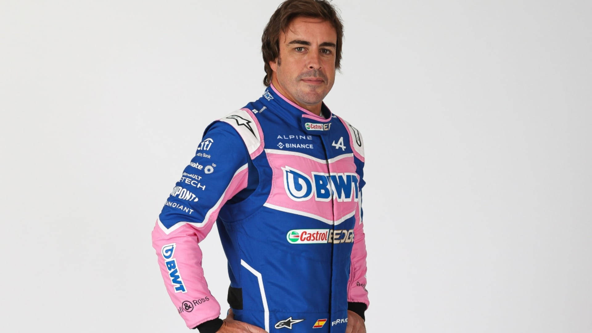 Fernando Alonso Pink And Blue Suit Background