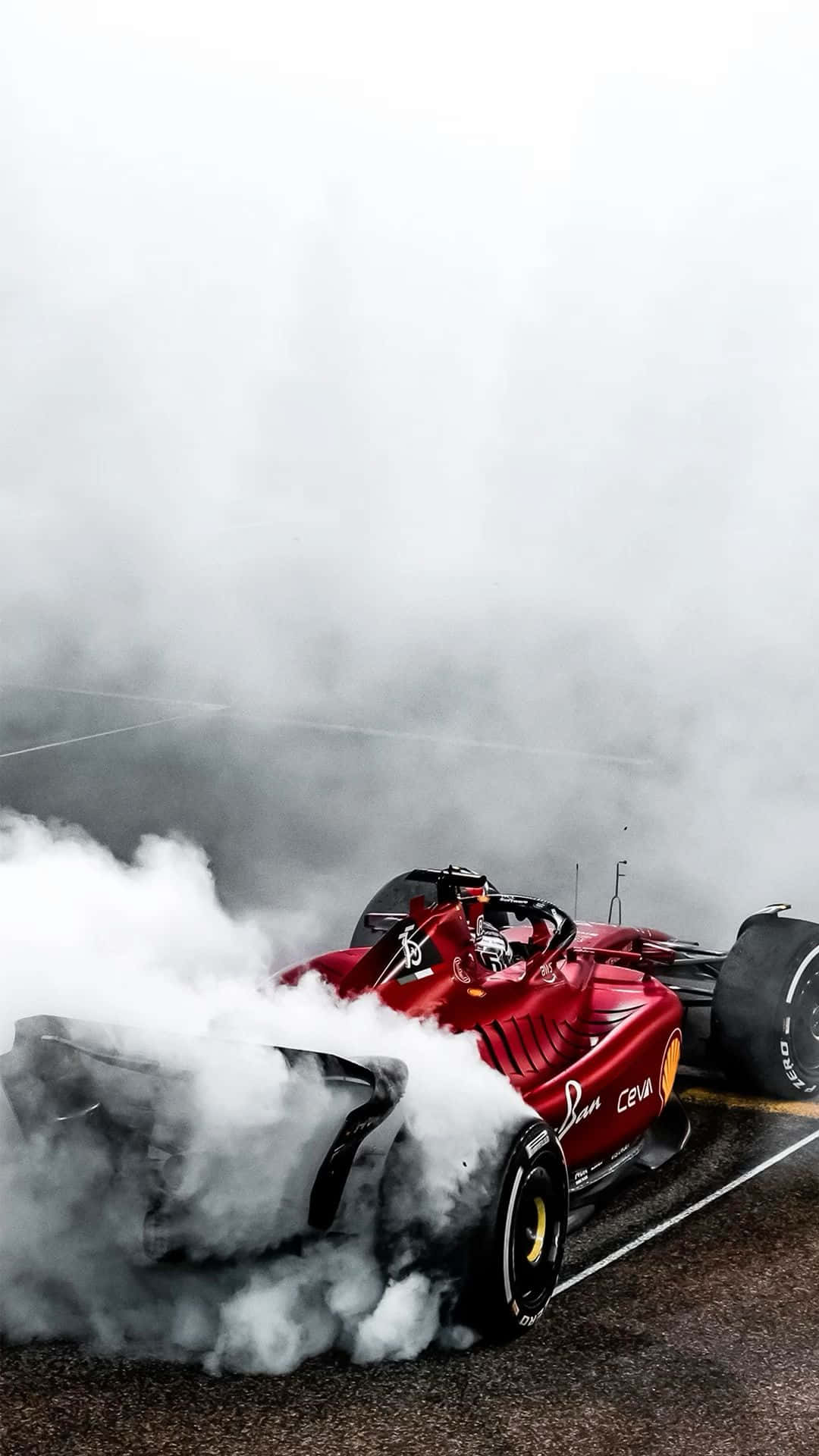 Ferrari F1 Car Burnoutin Fog Background
