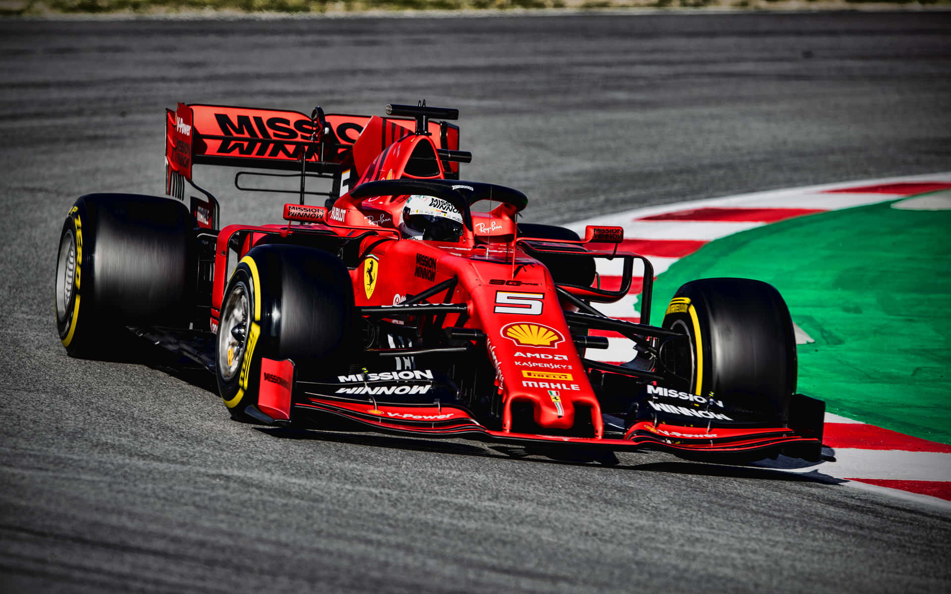 Ferrari F1 Car Driving On A Track Background