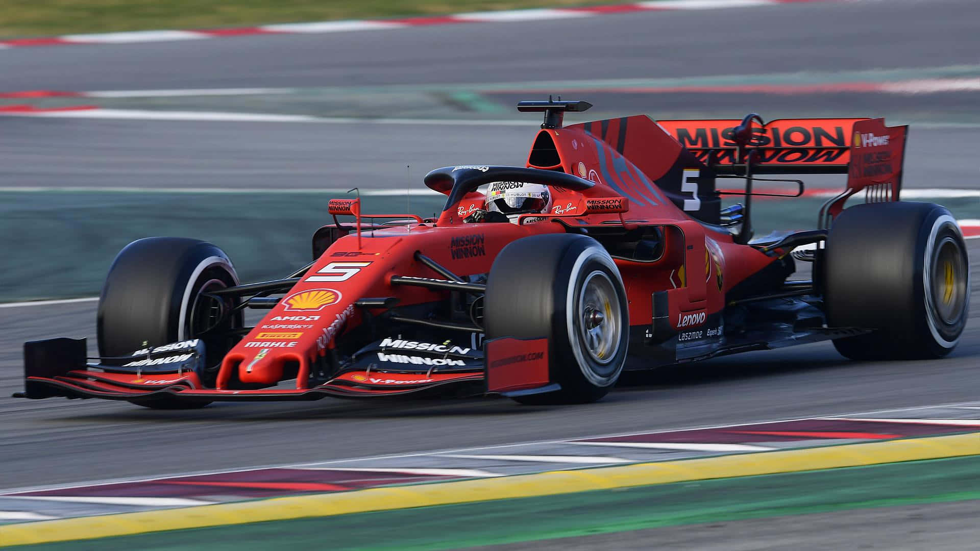 Ferrari F1 Car Driving On A Track Background
