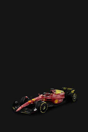 Ferrari F1 Drivers Rev It Up At High Speed Background