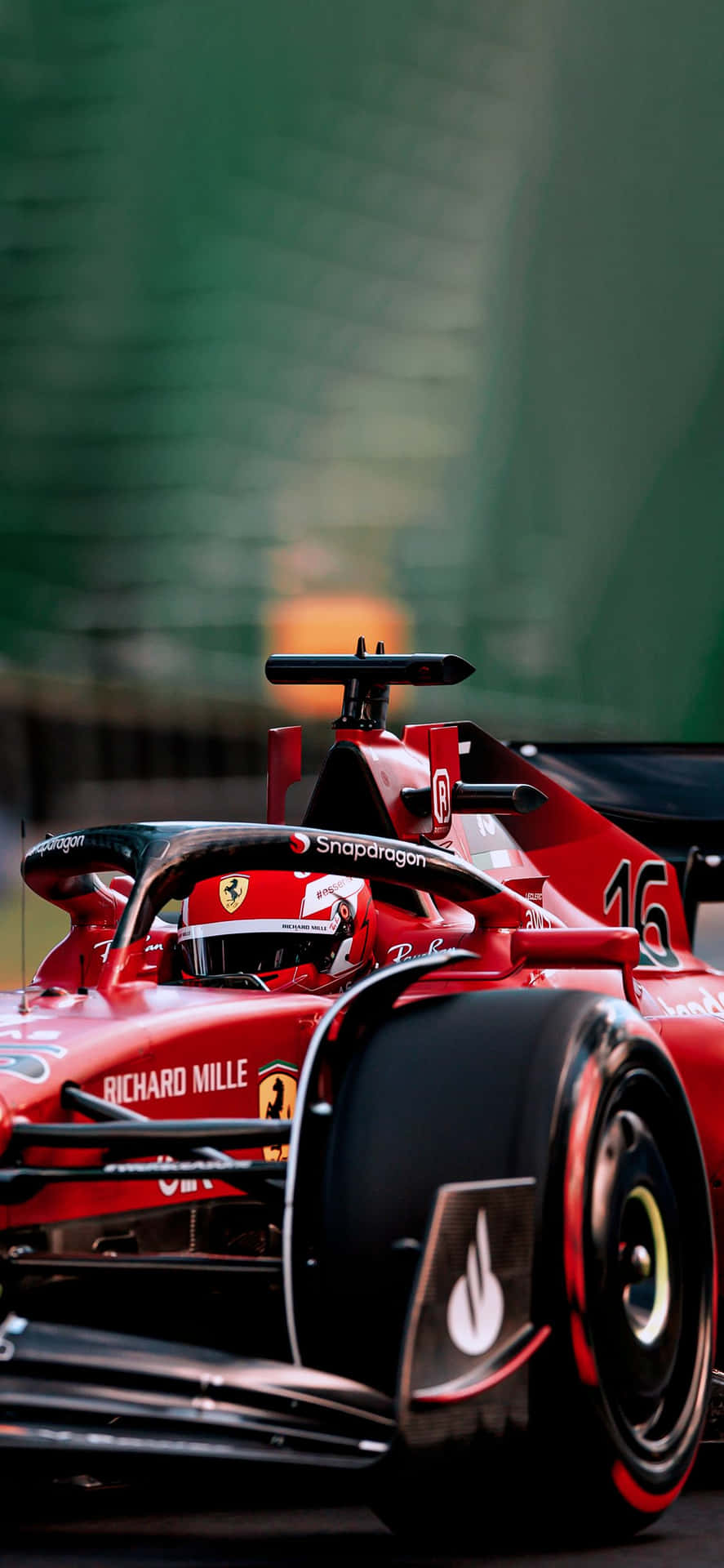 Ferrari F1 Racing Car Track Action Background