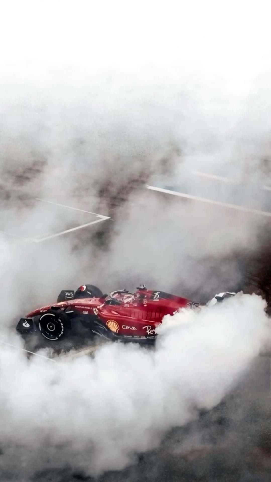 Ferrari F1 Racingin Smoke Background