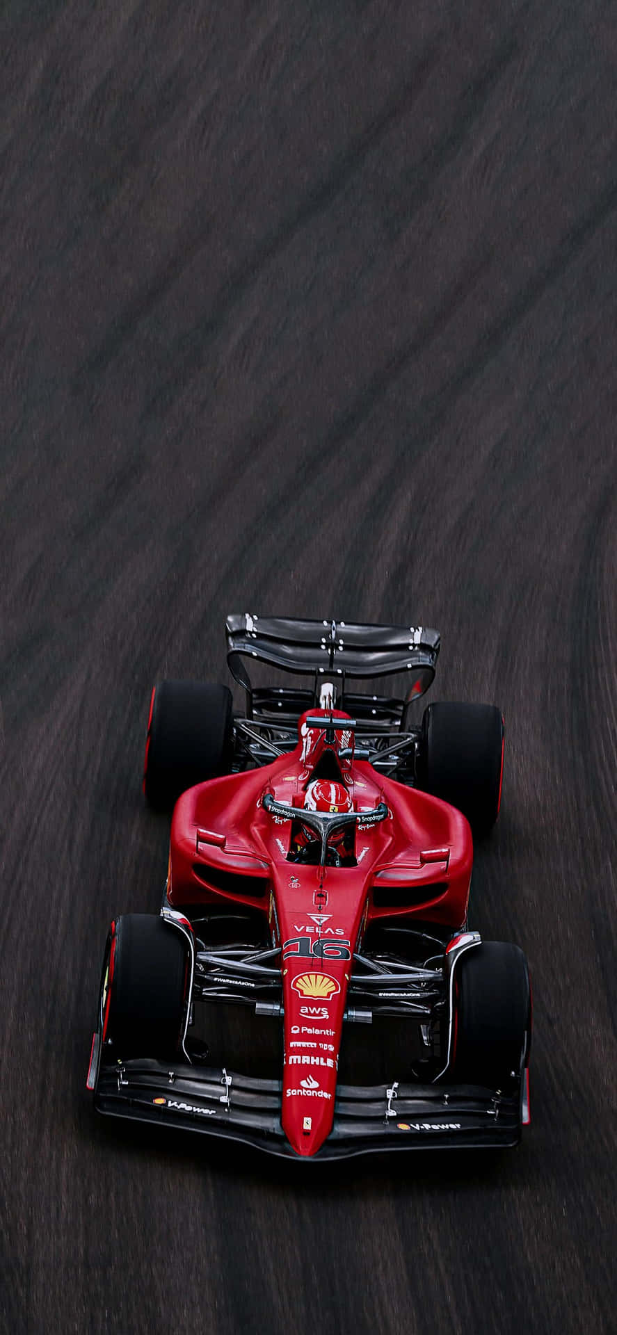 Ferrari F1 Racingon Track.jpg Background