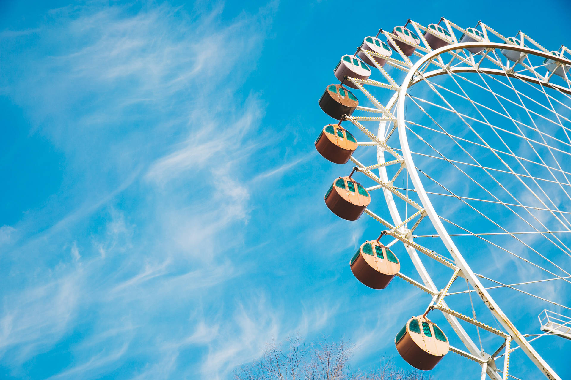 Ferris Wheel And Blue Sky Background