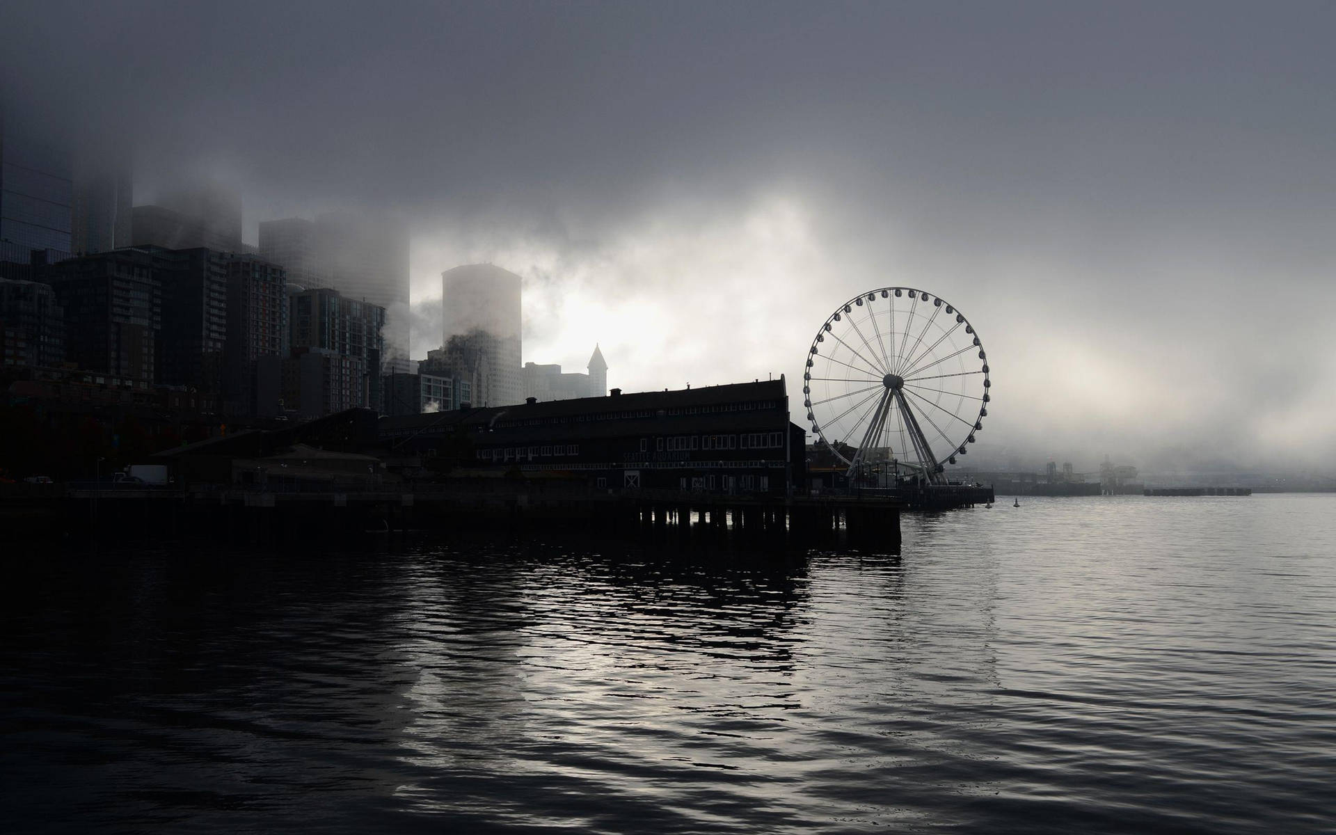 Ferris Wheel Under Gloomy Sky Background