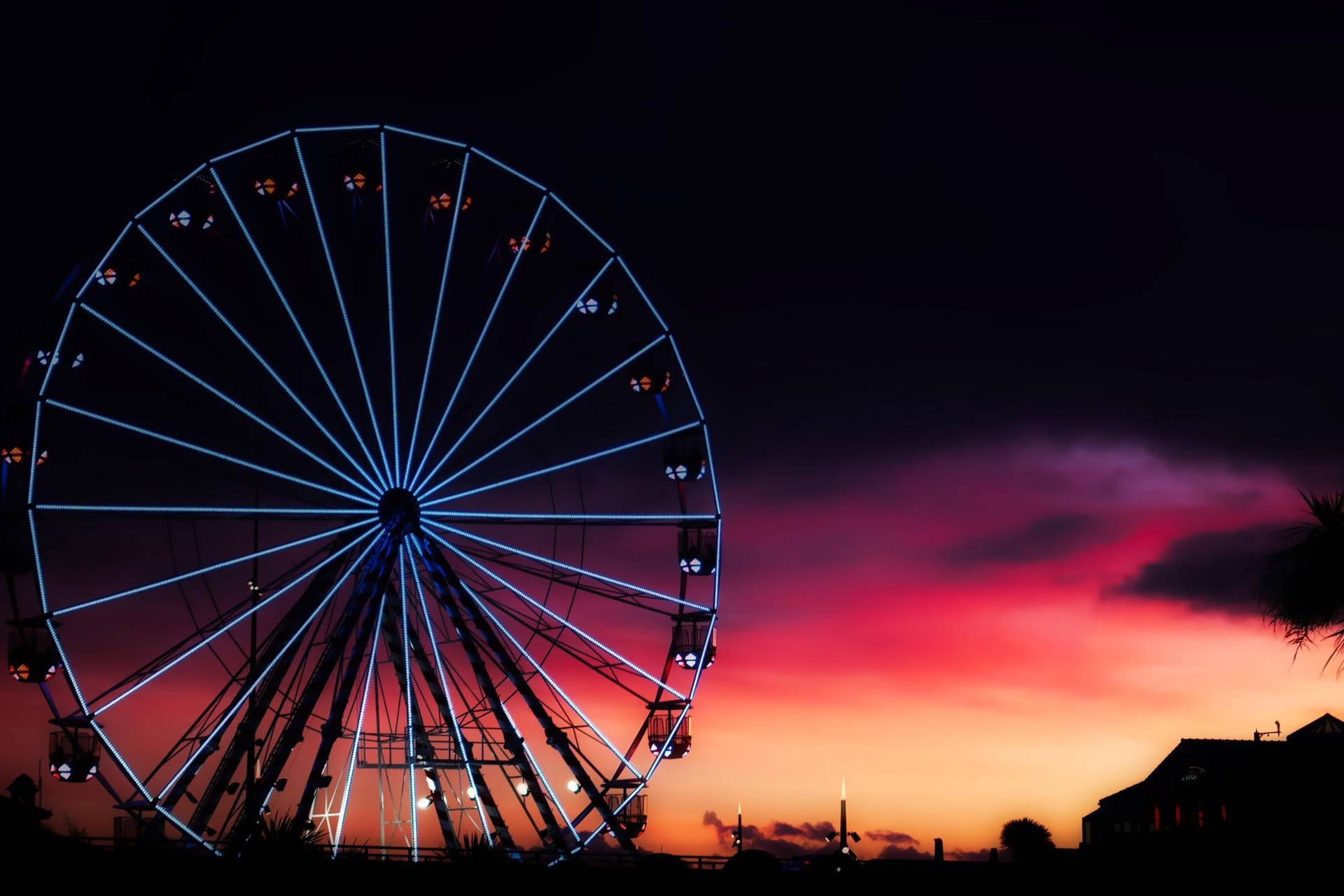 Ferris Wheel With Dreamy Sunset Background