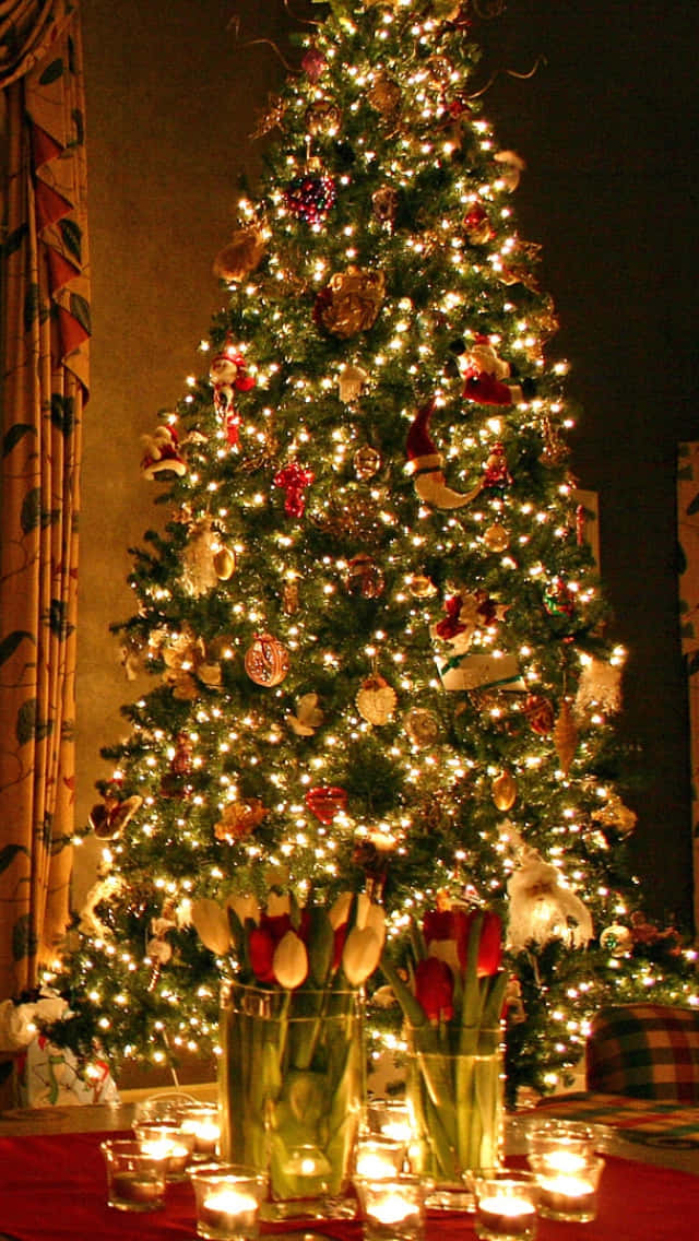 Festive Christmas Tree With Lightsand Decorations Background