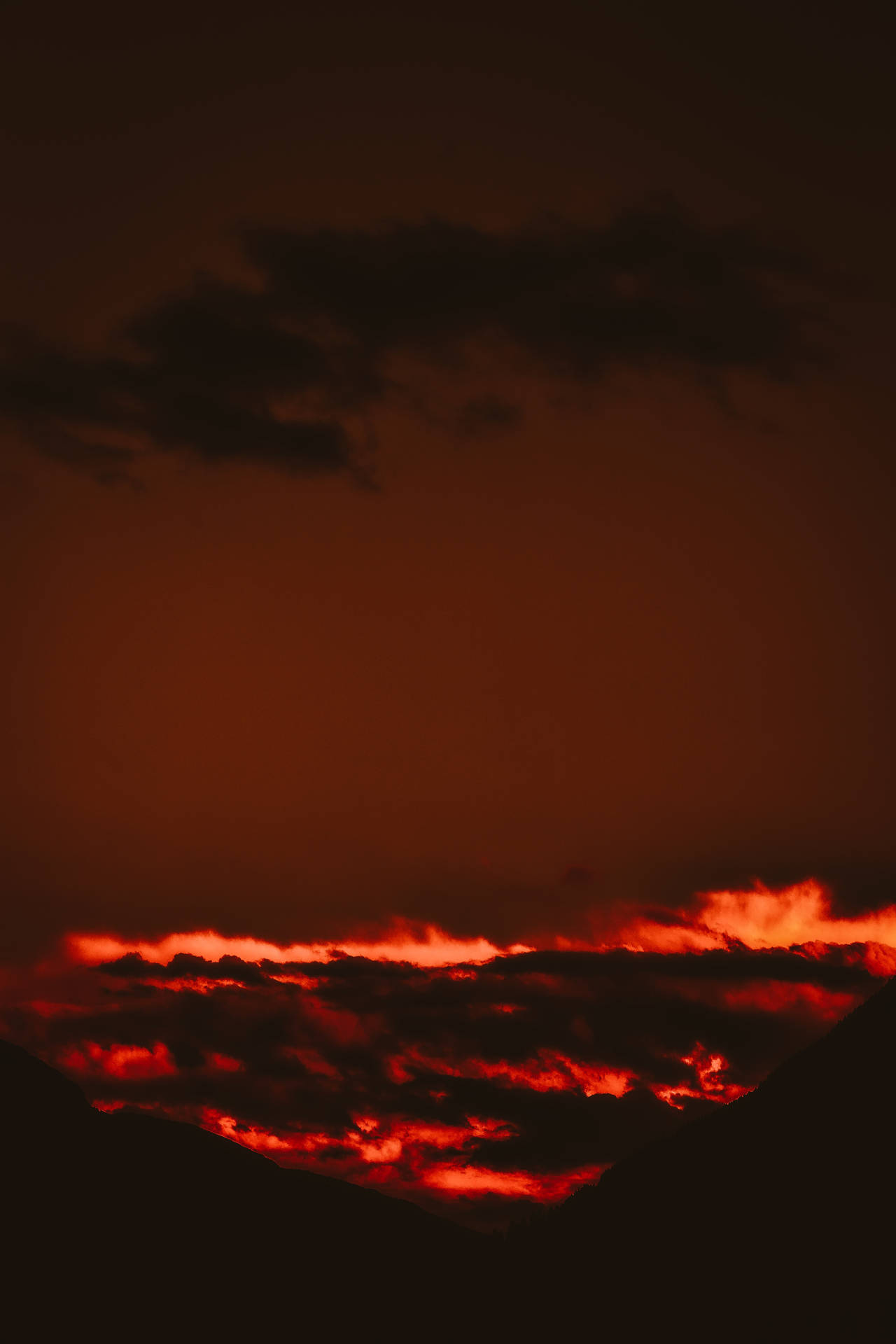 Fiery Red Clouds In Red Orange Sunset Background