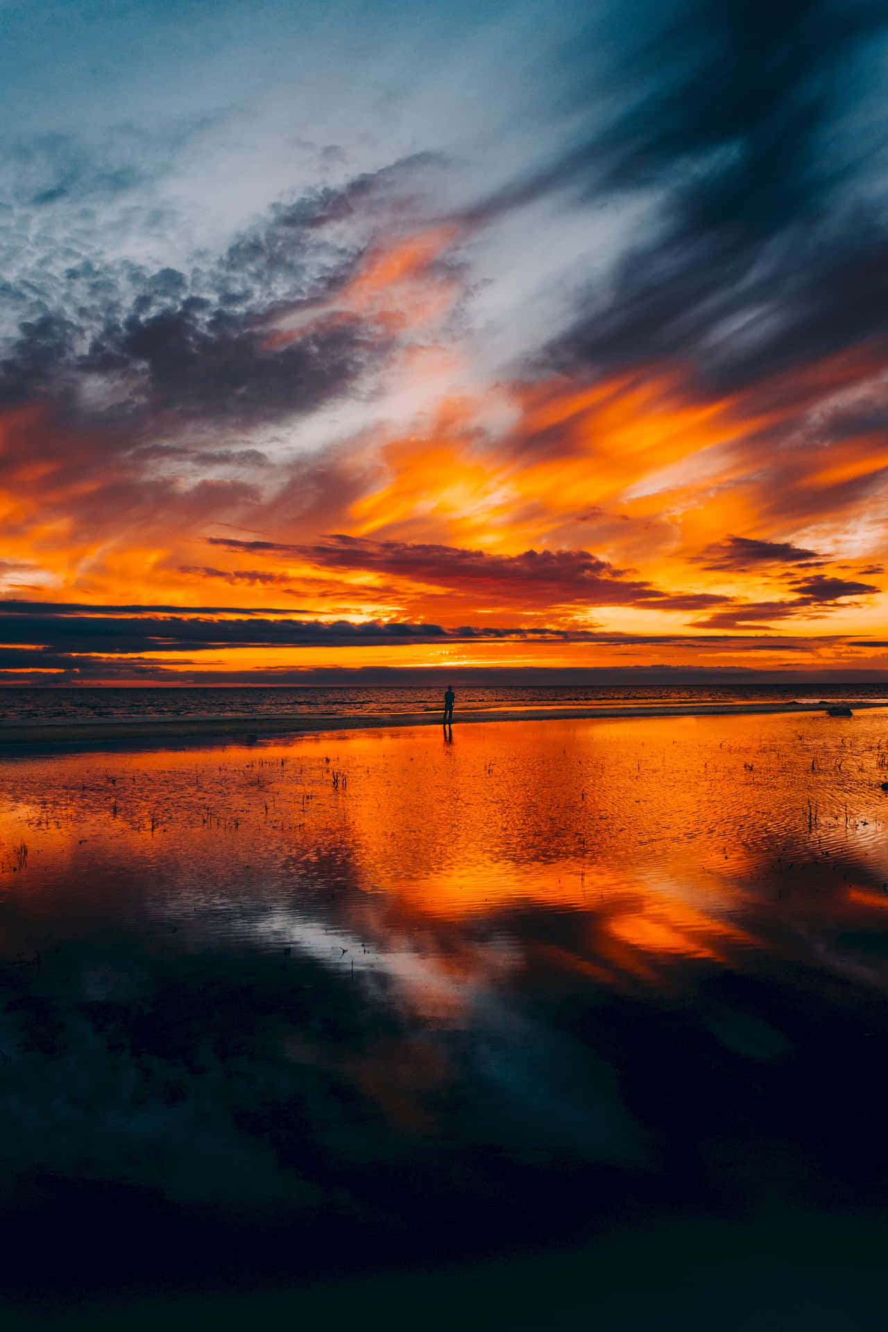 Fiery Sunset Silhouette Background