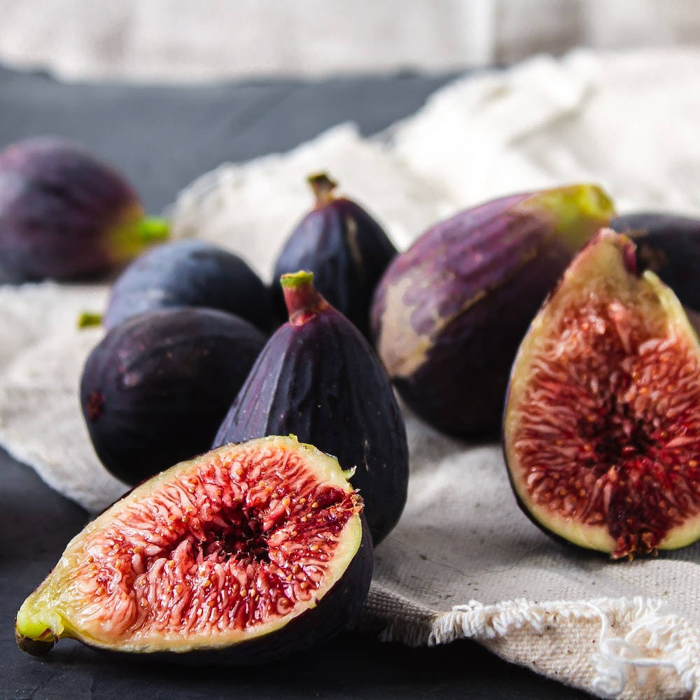 Fig Fruits On A Table With Burlap Sack Background