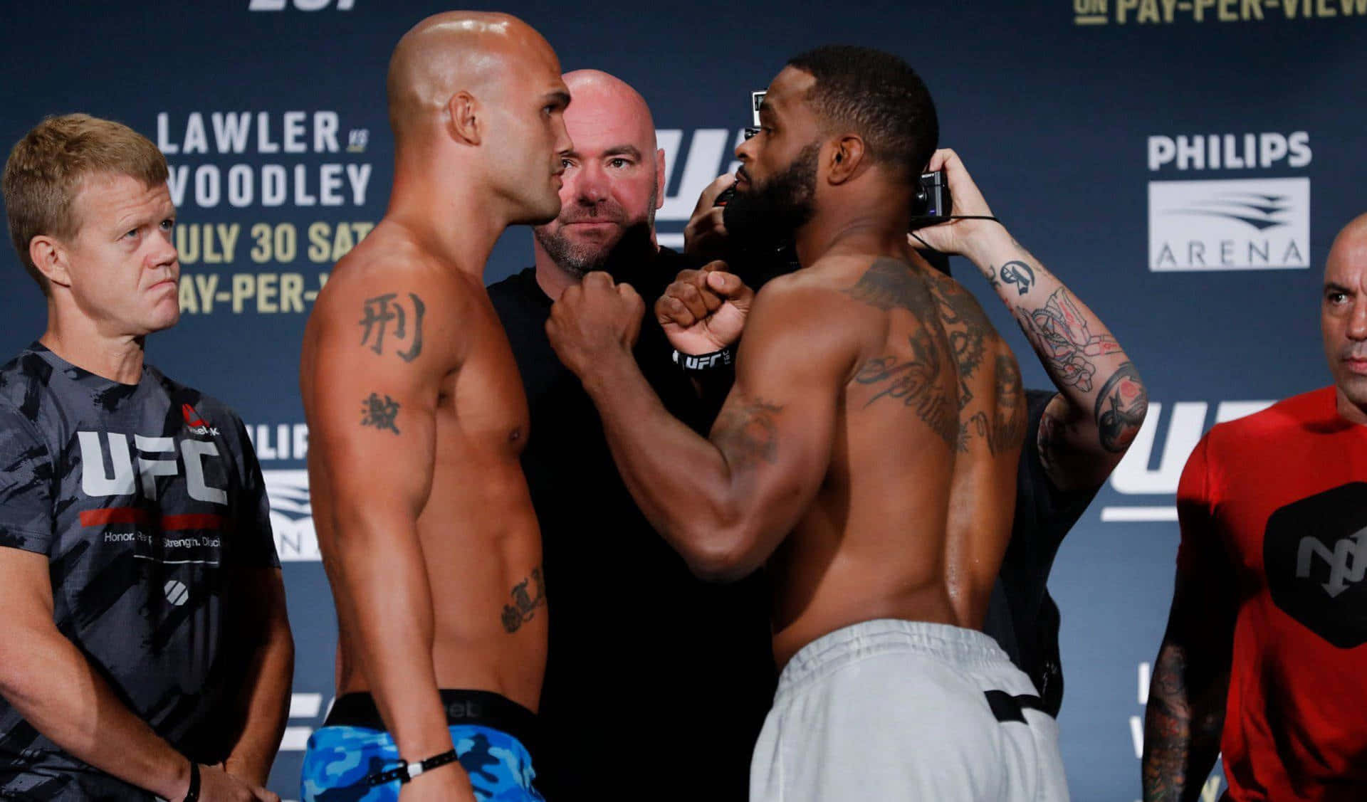 Fight Stance - Robbie Lawler Against Tyron Woodley In Ufc Match Background