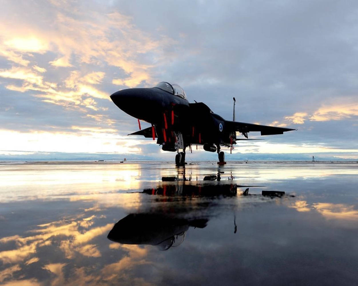 Fighter Jet On Wet Tarmac Background