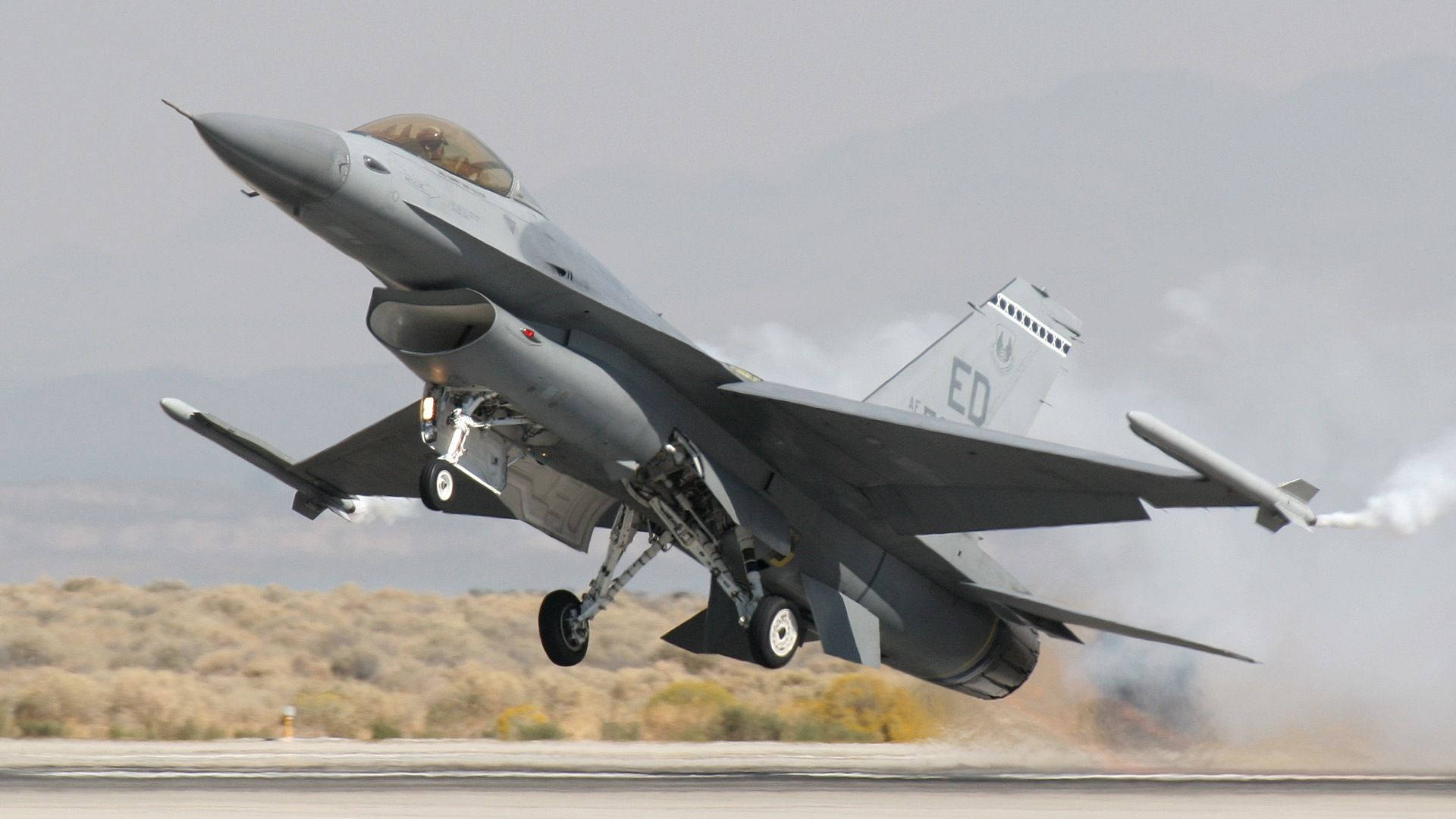 Fighter Jet Taking Flight Background