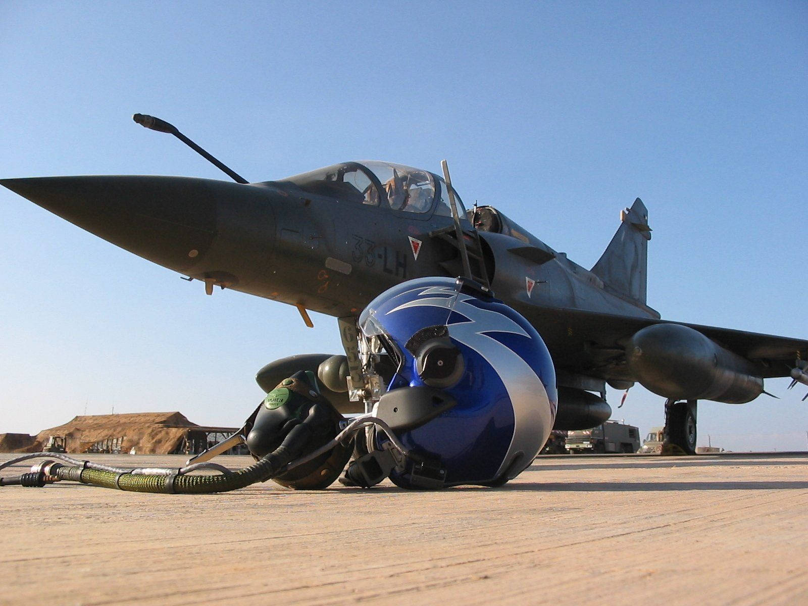 Fighter Jet With A Pilot Helmet Background