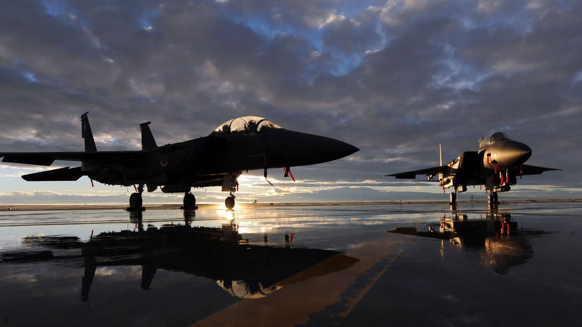 Fighter Jets Parked During Sunset Background