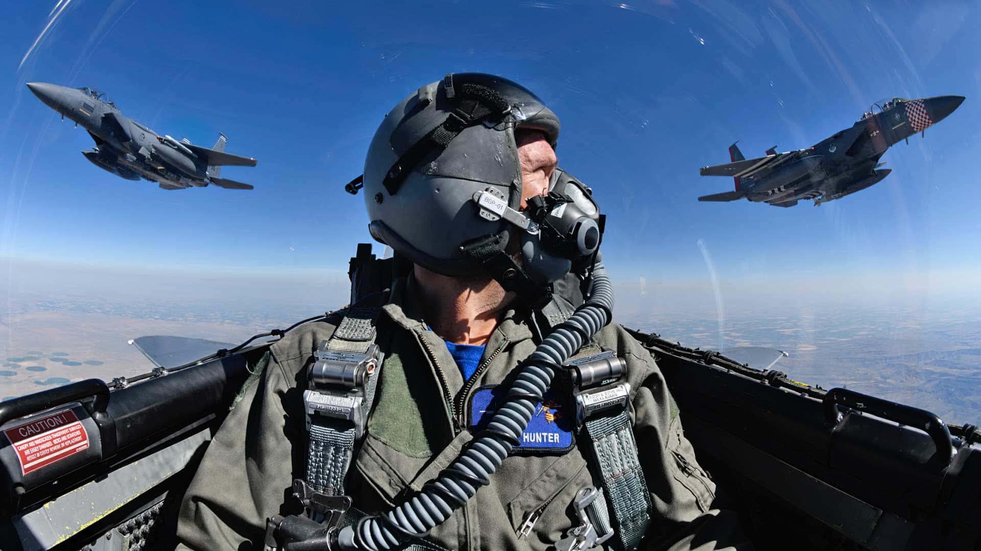 Fighter Pilot Air Force In Between Two Planes Background