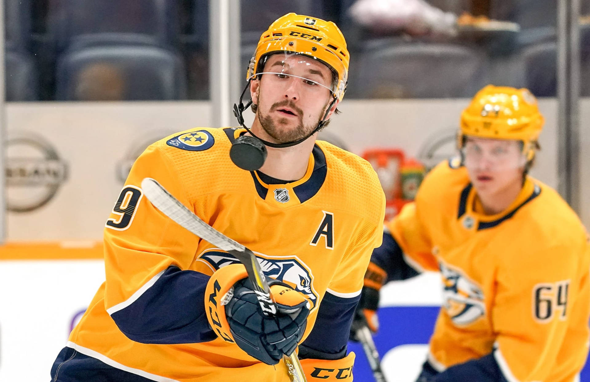 Filip Forsberg And Mikael Granlund Celebrating A Successful Play. Background