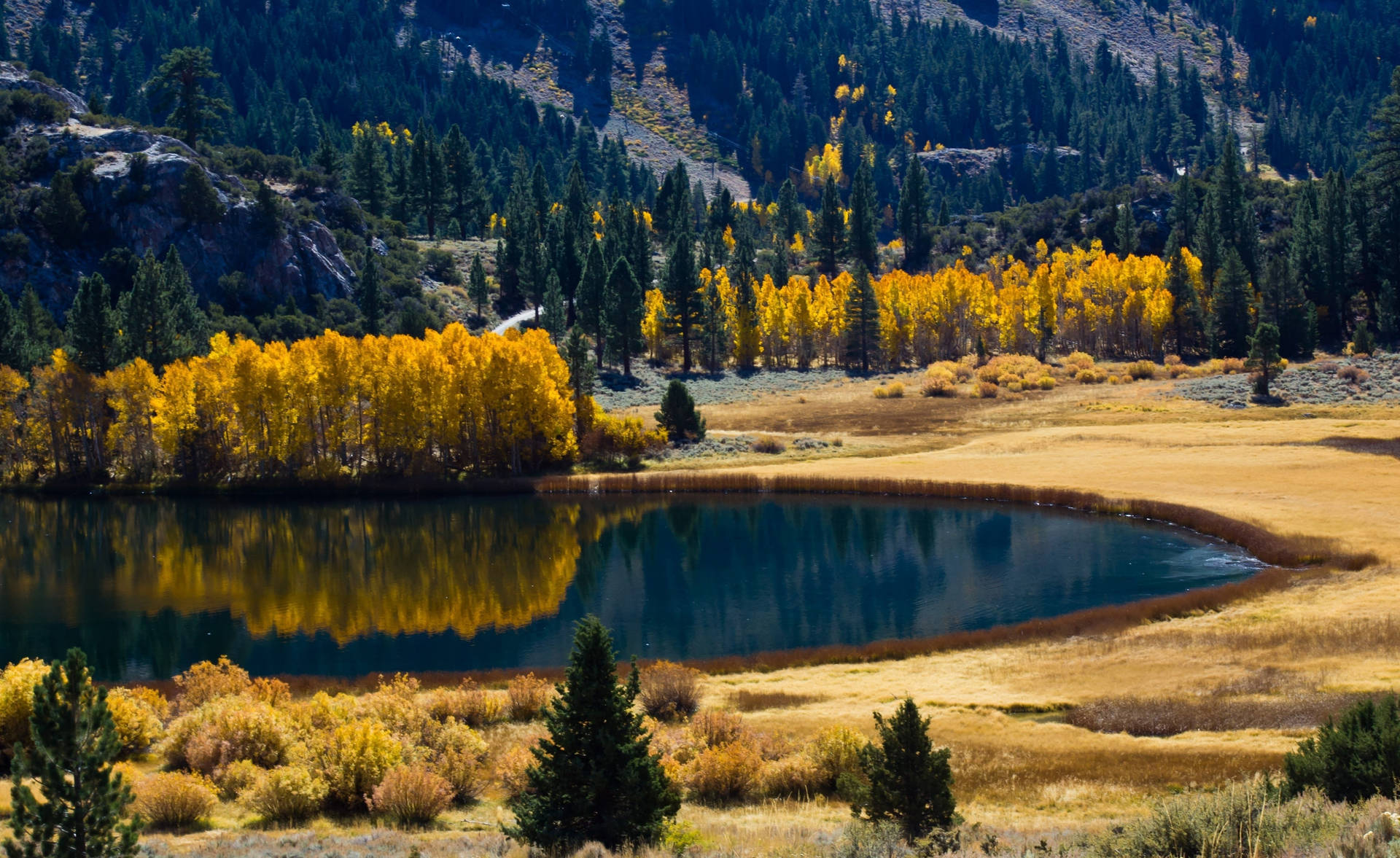 Find Bliss In The Beauty Of Autumn With A Hike In The Mountains Background