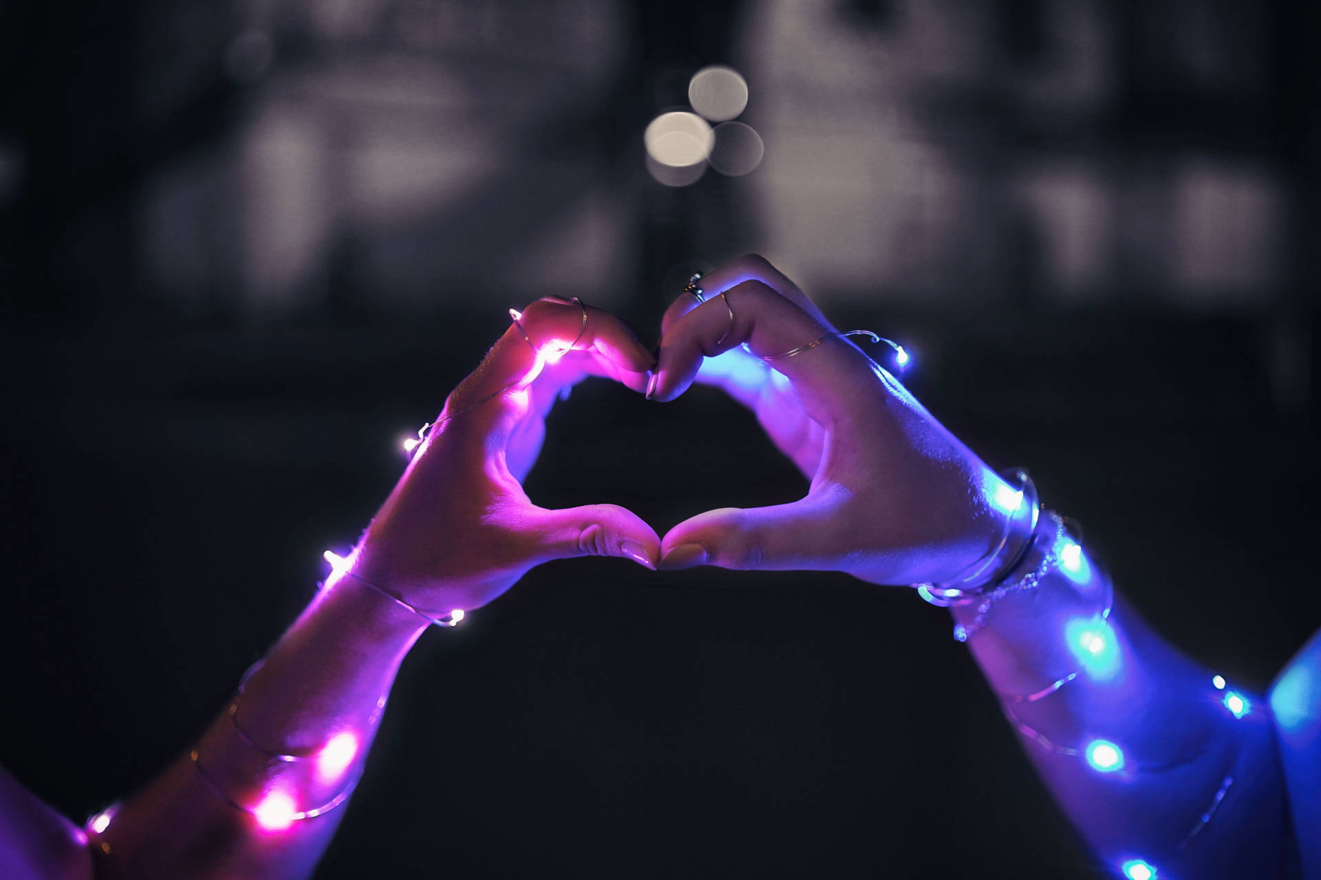 Finger Heart And Fairy Lights Background