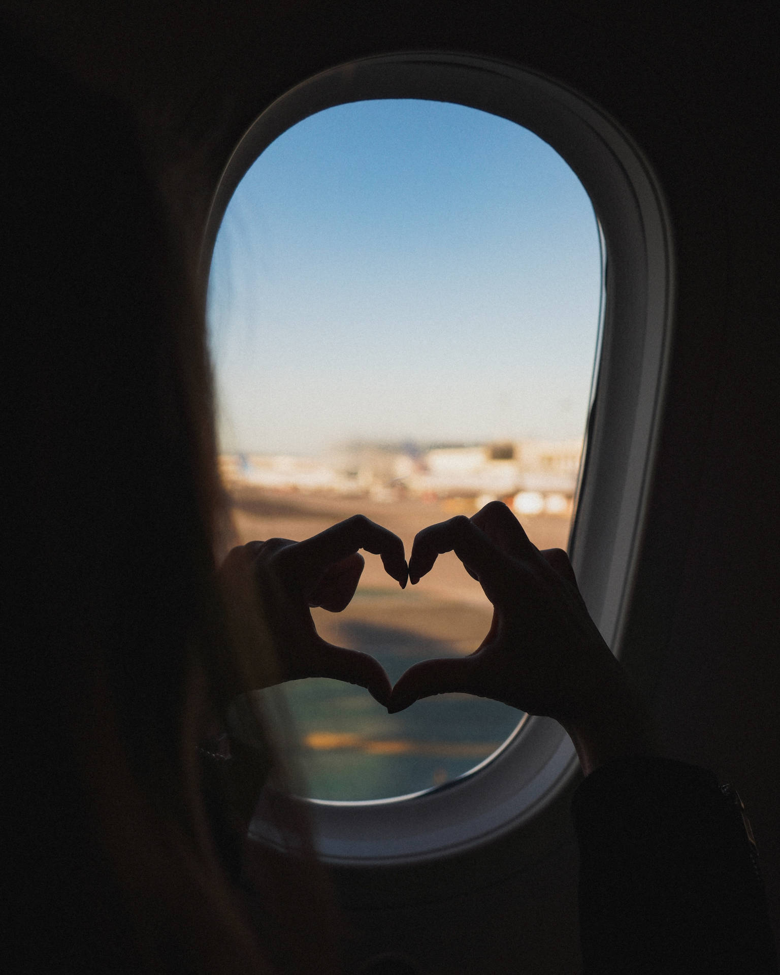 Finger Heart On An Airplane Ride