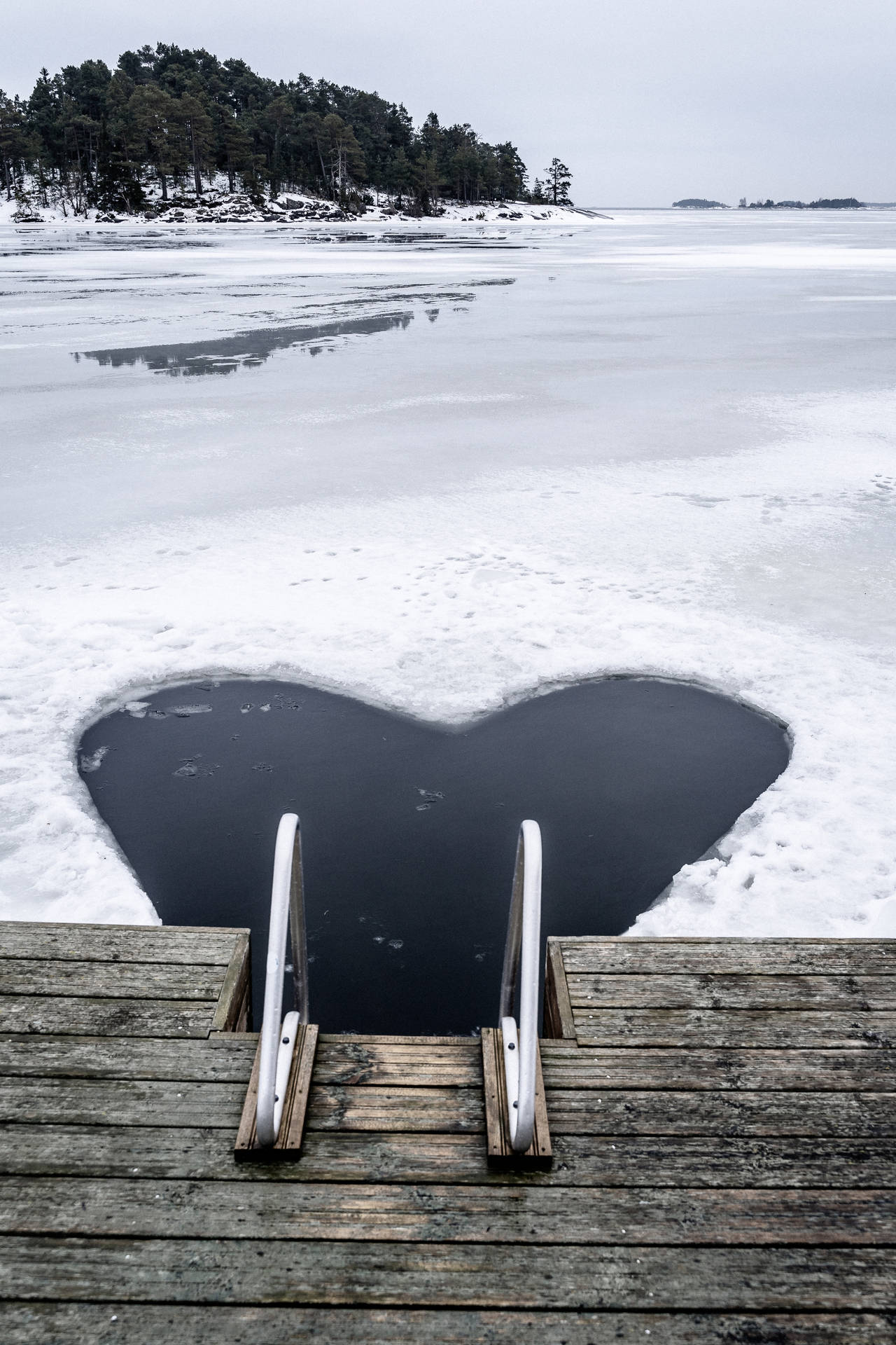 Finland Heart Shaped Icy Water Background