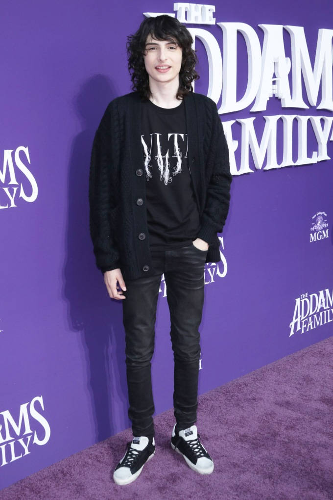 Finn Wolfhard At The Addams Family Red Carpet Event. Background