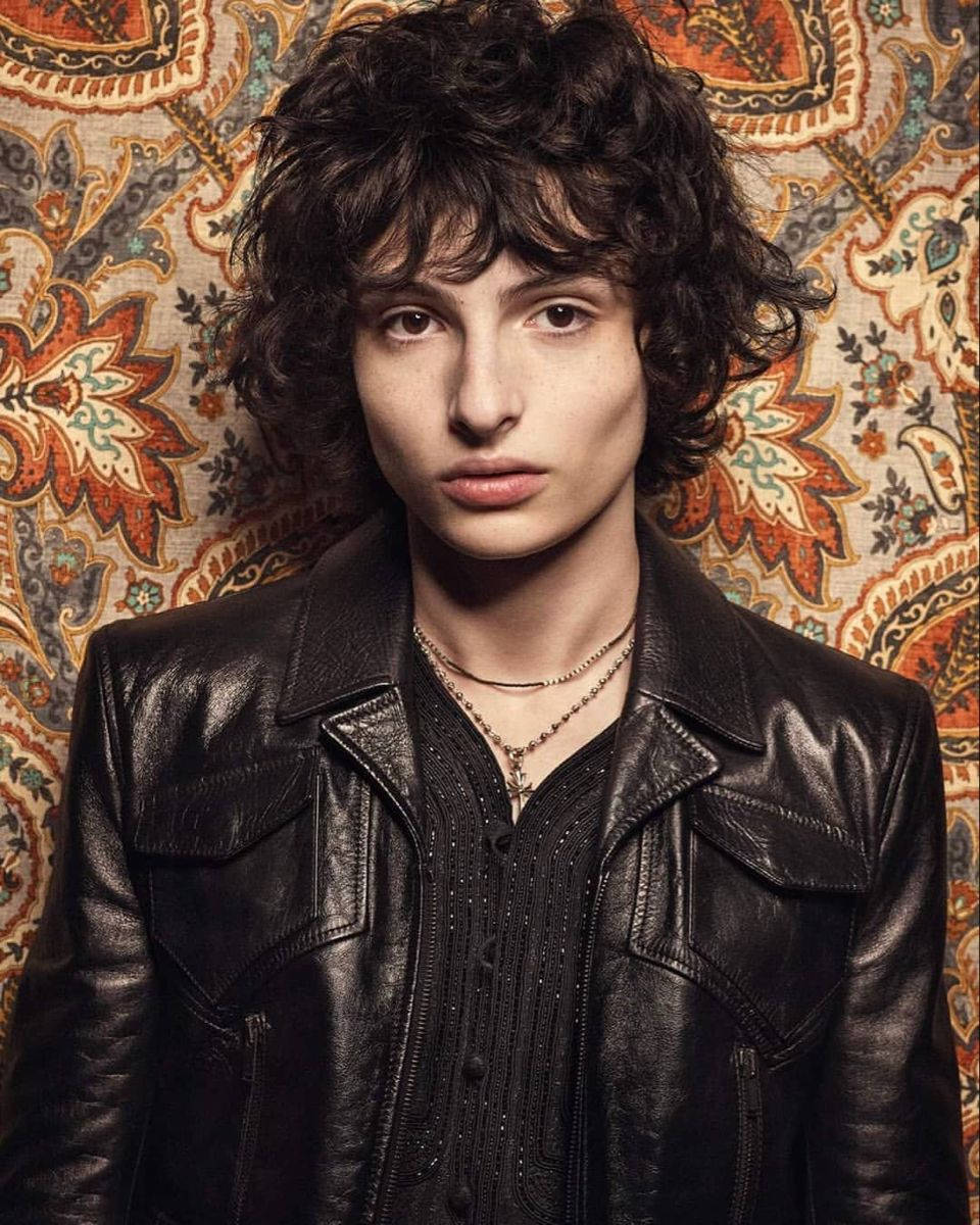 Finn Wolfhard In Leather Background