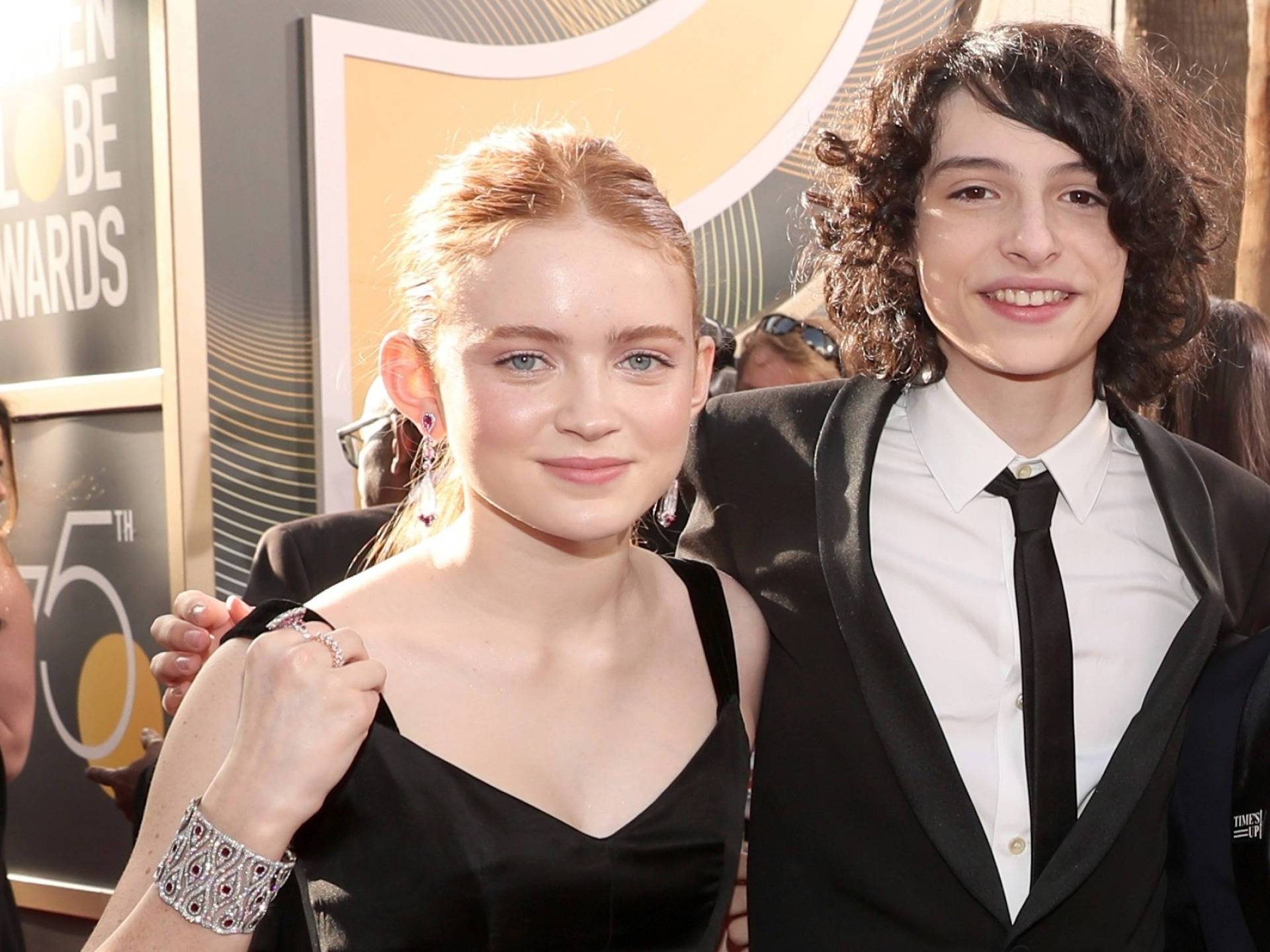 Finn Wolfhard With Co-star Background