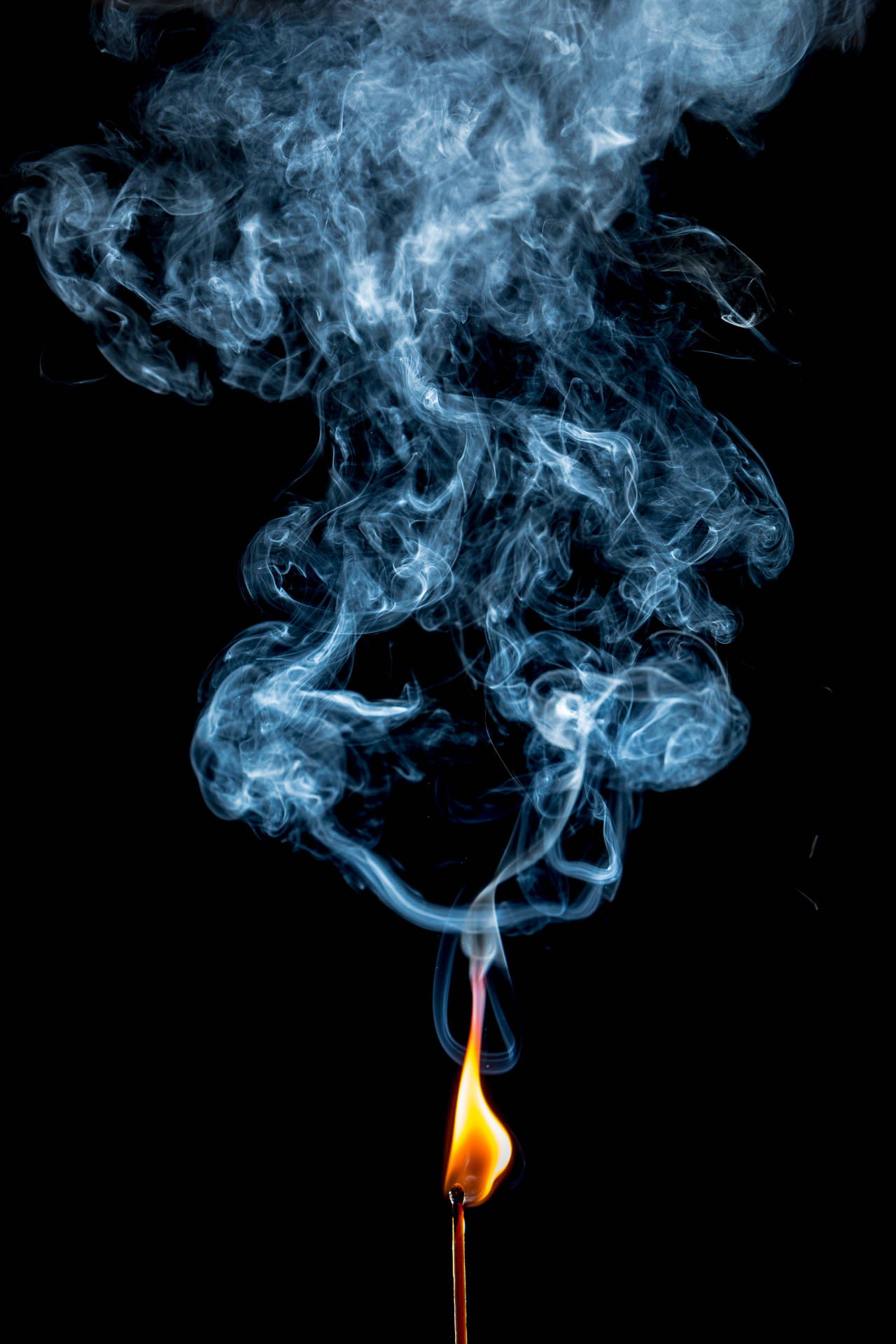 Fire At The Tip Of A Matchstick Background